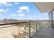 Balcony view of the Las Vegas skyline with an elegant glass railing at 4381 W Flamingo Rd # 922, Las Vegas, NV 89103