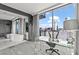 Bedroom and adjacent bathroom showing both city views and a soaking tub, enhancing the appeal and comfort of the space at 4381 W Flamingo Rd # 922, Las Vegas, NV 89103
