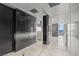 Hallway featuring mirrored walls and access to the kitchen, creating an open and visually expansive transition space at 4381 W Flamingo Rd # 922, Las Vegas, NV 89103