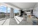 Bright and airy open-plan living room with floor to ceiling windows, views of the city, and comfortable seating at 4381 W Flamingo Rd # 922, Las Vegas, NV 89103