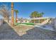 Spacious backyard features a pool with a cover and ample space for outdoor activities and enjoyment at 4495 Park View Dr, Las Vegas, NV 89104