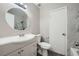 Neutral bathroom featuring a modern vanity with a round mirror and a separate toilet and shower at 4495 Park View Dr, Las Vegas, NV 89104