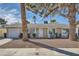 Charming one-story home with a driveway and desert landscaping at 4495 Park View Dr, Las Vegas, NV 89104