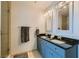 Bathroom with double sinks, granite counters and a walk-in shower at 4525 Dean Martin Dr # 2001, Las Vegas, NV 89103