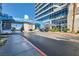 Inviting entrance to Panorama Towers with a circular driveway at 4525 Dean Martin Dr # 2001, Las Vegas, NV 89103