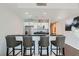 Stylish kitchen features stainless steel appliances and bar seating with four stools at 4525 Dean Martin Dr # 2001, Las Vegas, NV 89103