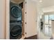 Modern stackable washer and dryer in hallway at 4525 Dean Martin Dr # 2001, Las Vegas, NV 89103