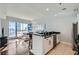 Bright, open floor plan with a seamless transition from the kitchen to the living area and balcony at 4525 Dean Martin Dr # 2001, Las Vegas, NV 89103
