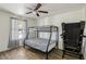 Bedroom featuring wood floors, and a bunk bed at 4528 Welter Ave, Las Vegas, NV 89104