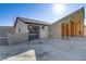 View of the home's backyard and the detached carport/garage at 4629 Cattleman Ave, North Las Vegas, NV 89031