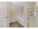Bathroom featuring a large tub and separate shower at 4629 Cattleman Ave, North Las Vegas, NV 89031