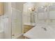 Bathroom featuring a shower and double sinks at 4629 Cattleman Ave, North Las Vegas, NV 89031