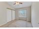 Bedroom with a ceiling fan, carpet flooring, and closet at 4629 Cattleman Ave, North Las Vegas, NV 89031