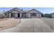 Charming single-story home featuring a low maintenance yard and a spacious driveway at 4629 Cattleman Ave, North Las Vegas, NV 89031