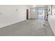 A spacious garage with sliding glass doors offers potential for various uses and natural light at 4629 Cattleman Ave, North Las Vegas, NV 89031