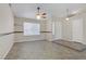 Living room with large window providing ample natural light and tile floors at 4629 Cattleman Ave, North Las Vegas, NV 89031