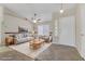 Bright living room featuring vaulted ceilings, ceiling fan and nice furnishings at 4629 Cattleman Ave, North Las Vegas, NV 89031