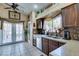 Kitchen featuring stainless steel appliances, mosaic tile backsplash, and French doors to the exterior at 489 Beaconwood St, Henderson, NV 89052