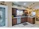 Kitchen with stainless steel appliances, granite countertops, and decorative elements at 489 Beaconwood St, Henderson, NV 89052
