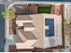 Nevada home featuring solar panels, landscaping, and a well maintained roof at 5601 Quail Meadow Ct, Las Vegas, NV 89131