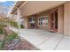 Charming back patio with a pergola cover, ample space, and access to the home at 5601 Quail Meadow Ct, Las Vegas, NV 89131