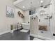 This updated bathroom is bright and airy with a soaking tub and a glass-enclosed shower at 5601 Quail Meadow Ct, Las Vegas, NV 89131