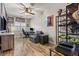 Bright office with a ceiling fan, modern desk, and sleek flooring at 5601 Quail Meadow Ct, Las Vegas, NV 89131