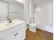 Bathroom with a white vanity, tile flooring, and a shower-tub combo at 7255 W Sunset Rd # 1116, Las Vegas, NV 89113