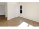 Bright bedroom featuring tile flooring, a sliding door closet and a window with exterior view at 7255 W Sunset Rd # 1116, Las Vegas, NV 89113
