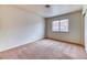 Cozy bedroom offering a window view, carpeted floors, and ample natural light at 7820 Wedlock Ln, Las Vegas, NV 89129