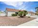 Well-maintained single-story house featuring desert landscaping and a classic tile roof at 7820 Wedlock Ln, Las Vegas, NV 89129