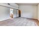 Spacious main bedroom with carpeted floors, offering ensuite access to the bathroom at 7820 Wedlock Ln, Las Vegas, NV 89129