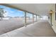 Covered back patio providing shade and views of the expansive backyard, perfect for entertaining or relaxation at 822 Fairview Dr, Henderson, NV 89015