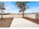 Large backyard with ample space, enclosed by a white fence and potential for customization at 822 Fairview Dr, Henderson, NV 89015