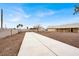Wide concrete driveway leading to the property, offering ample parking space and potential for RV parking at 822 Fairview Dr, Henderson, NV 89015