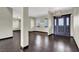 Foyer showing dark hardwood floors and a decorative light fixture at 822 Fairview Dr, Henderson, NV 89015