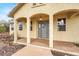 Covered front entrance with decorative lights and desert landscape at 822 Fairview Dr, Henderson, NV 89015