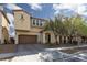 Charming two-story home with a paved driveway and beautifully landscaped front yard at 8501 Bellery Ave, Las Vegas, NV 89143