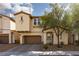 Inviting two-story home with a well-manicured front yard and a welcoming entrance at 8501 Bellery Ave, Las Vegas, NV 89143