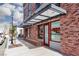 Attractive storefront with a red brick facade, awning, large windows, and pedestrian friendly streetscape at 8501 Bellery Ave, Las Vegas, NV 89143