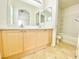 Bathroom features a double vanity, ample counter space, and a shower-tub combination, designed for convenience at 8748 Tomnitz Ave # 103, Las Vegas, NV 89178