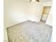 A carpeted bedroom with an open closet door at 8748 Tomnitz Ave # 103, Las Vegas, NV 89178