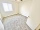 Bedroom featuring plush carpet, a window, a ceiling fan, and closet with sliding doors at 8748 Tomnitz Ave # 103, Las Vegas, NV 89178