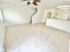 Open living space showcases tile floors and connects seamlessly to the kitchen area at 8748 Tomnitz Ave # 103, Las Vegas, NV 89178