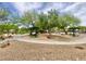 Community park featuring multiple picnic tables and ample greenery, a perfect spot for outdoor enjoyment at 8748 Tomnitz Ave # 103, Las Vegas, NV 89178