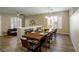 Open-concept dining room with contemporary design, flowing to the living area at 9446 Bondeno St, Las Vegas, NV 89123
