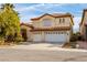 Charming two-story home with a three-car garage and well-maintained landscaping at 9446 Bondeno St, Las Vegas, NV 89123