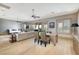Bright bonus room features a workspace, a seating area and a full sized bed at 9801 Orient Express Ct, Las Vegas, NV 89145