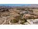 Sprawling estate boasts mountain views, landscaped grounds, resort-style pool, and plenty of space for entertaining at 9801 Orient Express Ct, Las Vegas, NV 89145