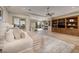 Spacious main bedroom featuring custom built-ins, recessed lighting, and a cozy sitting area at 9801 Orient Express Ct, Las Vegas, NV 89145